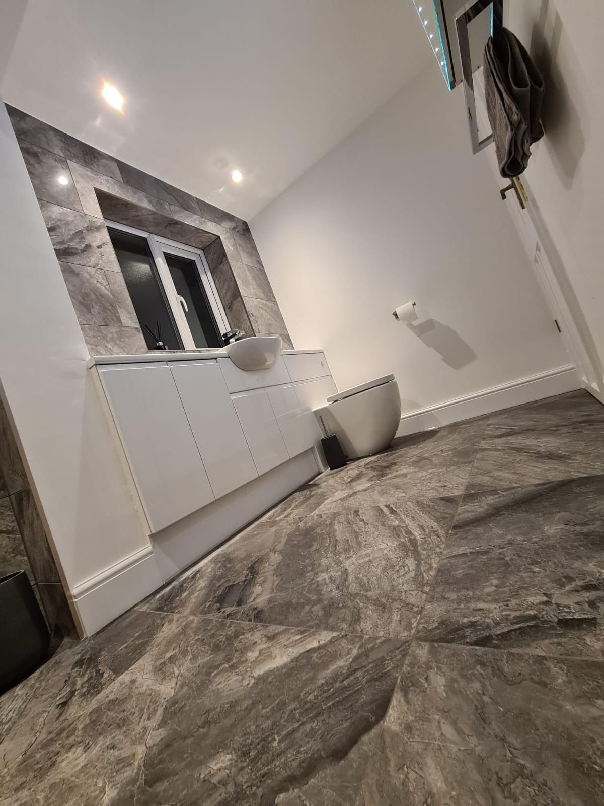 Basin and WC installation in the Farnborough Park bathroom